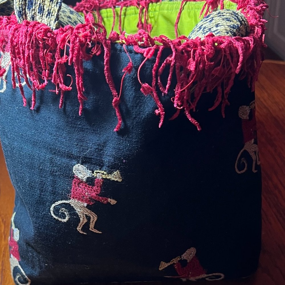 Unique Monkey playing trumpet bag with fringe